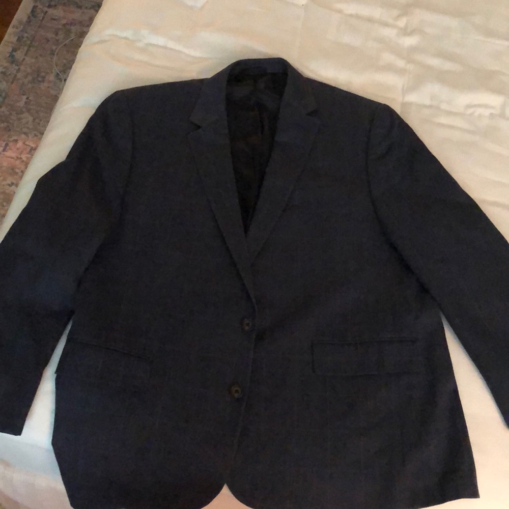 This is a navy plaid-ish sport coat
